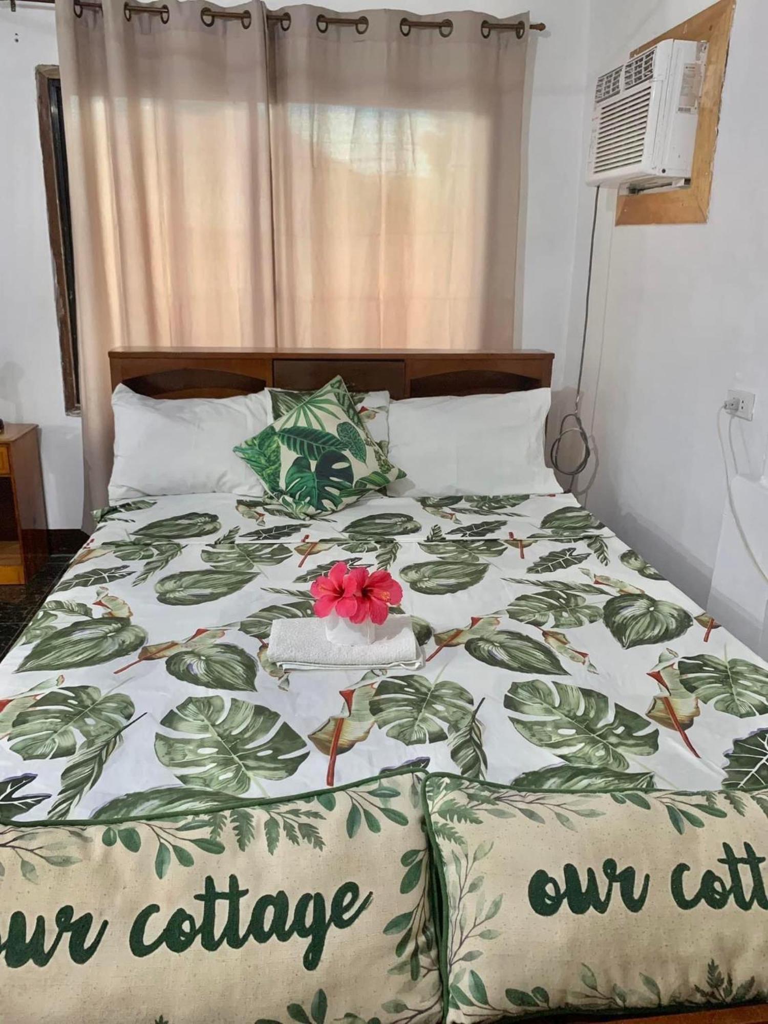 Panagsama Holiday Cottage Moalboal Bagian luar foto