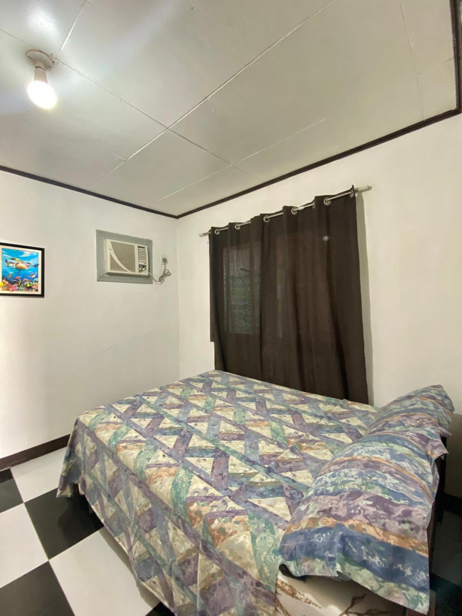 Panagsama Holiday Cottage Moalboal Bagian luar foto