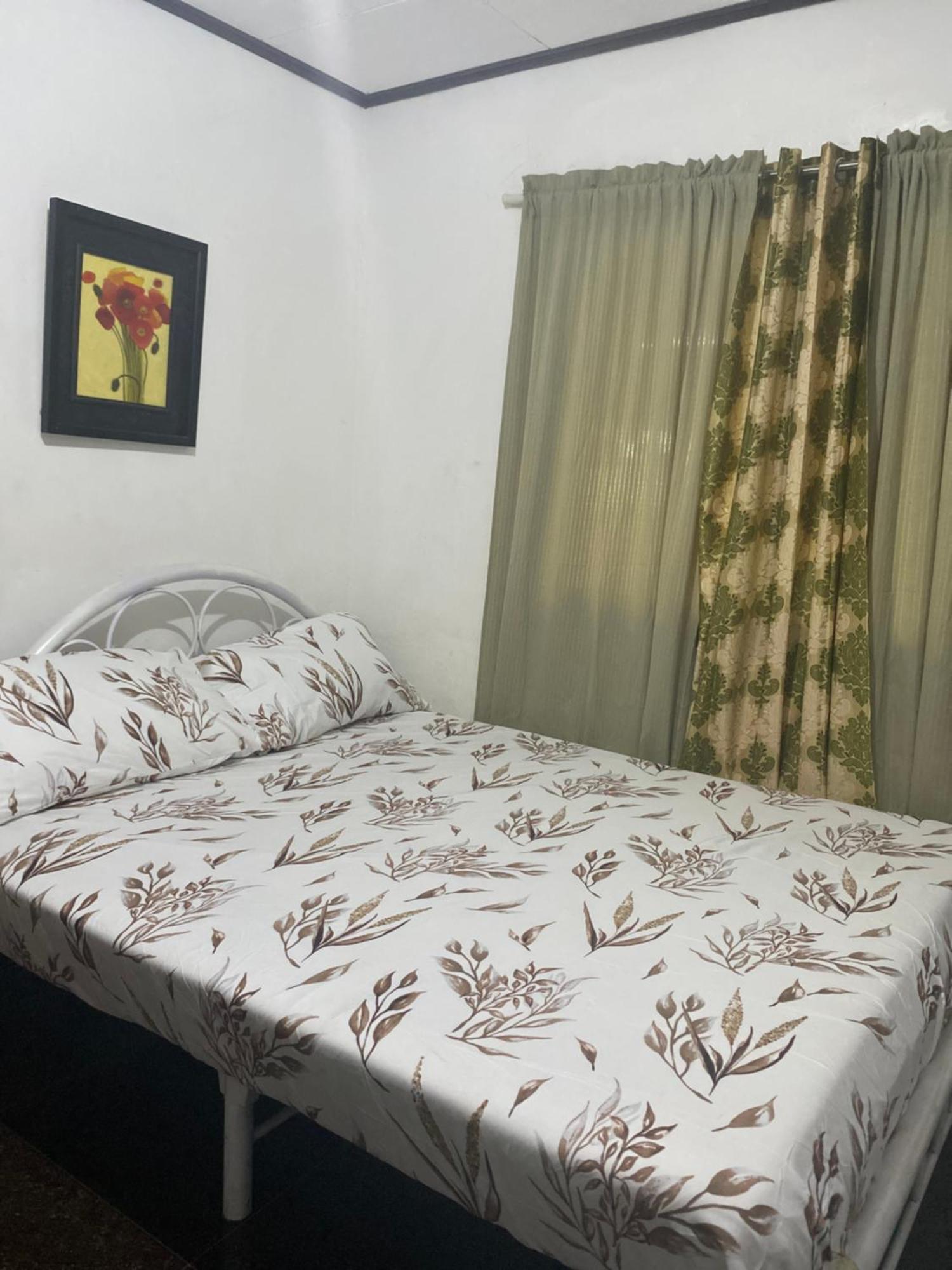 Panagsama Holiday Cottage Moalboal Bagian luar foto