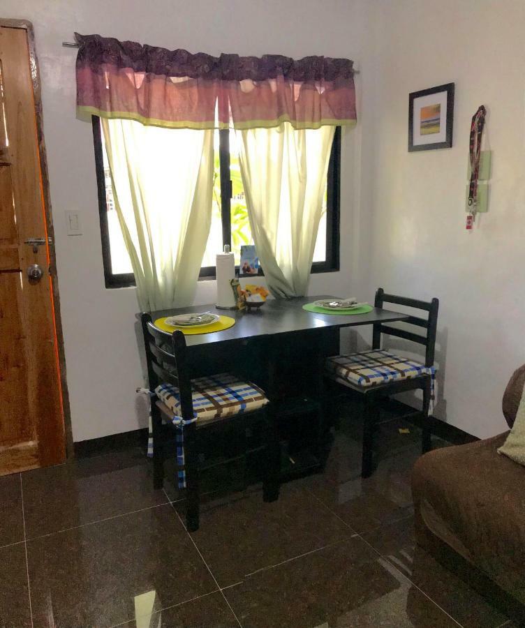 Panagsama Holiday Cottage Moalboal Bagian luar foto